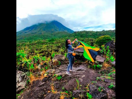 Jhunelle Jureidini represents the 876 on a recent trip to Costa Rica. While there, she visited the famous Arenal Volcano.