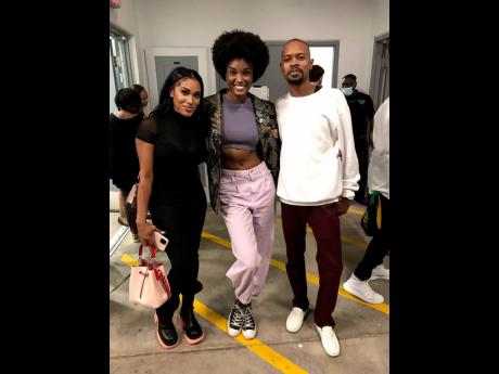From left: Aiesha Barrett, daughter of Aston ‘Family Man’ Barrett; Davina Bennett, second runner-up in the Miss Universe 2017 pageant and Jaime Hinckson, keyboardist for Julian Marley, hang out backstage at the A Night of Reggae Music Under the Stars c