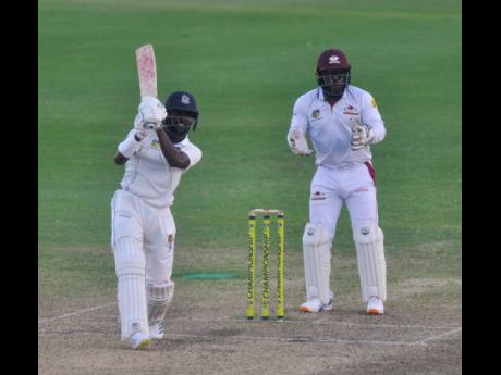 
Barbados Pride middle-order batsman Jonathan Carter drives through the offside during his man-of-the-match innings of 71 not out on the final day of a four-wicket West Indies Championship win over the Leeward Islands Hurricanes at the Kensington Oval yest