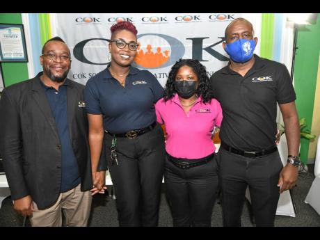From left: Norris Livingston, Abigale Scott, Nadine Matthews, and Larry Johnson at the COK Sodality Co-operative Credit Union annual staff meeting at the Jamaica Co-operative Credit Union League office on Manhattan Road in Kingston.