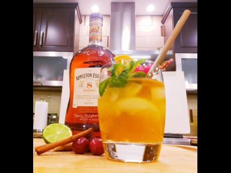 The Appleton Estate Eight Year Old Reserve rum with a splash of tangerine ginger punch.