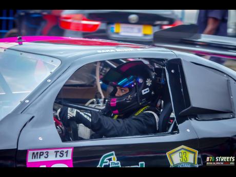 Sara Misir is a picture of concentration behind the wheel of her one-of-a-kind race car.