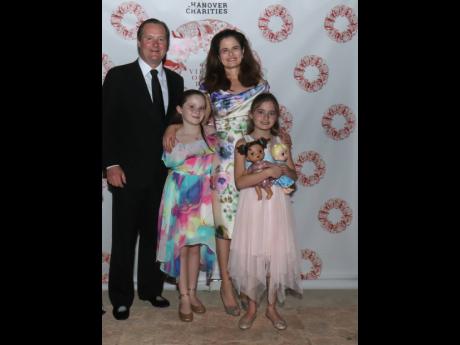 It was a family affair for Chris Mahan and wife, Merrill, who attended the Sugarcane Ball with their daughters Piper and Margaux.