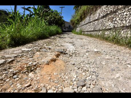 A section of an unasphalted road in Golden Spring, St Andrew West Rural.