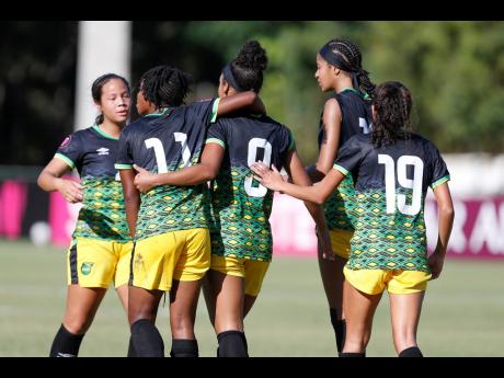 
Young Reggae Girlz striker Kameron Simmonds (centre) celebrates after scoring against Cuba during a Concacaf Women´s Under 20 Championship game at the Panamerican Stadium in San Cristobal, Dominican Republic.