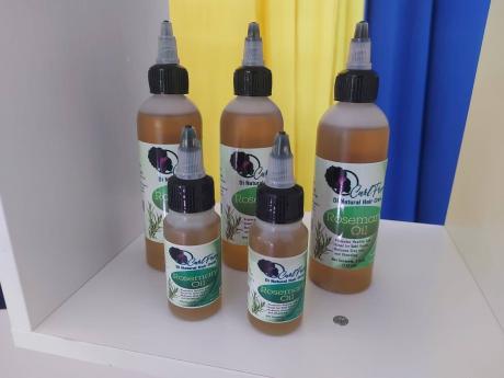 The brand Curlfrenz, owned by graduate Nastassia Bakeron on display at the graduation service of the Northwest Manchester Youth Entrepreneurship programme last Friday.
