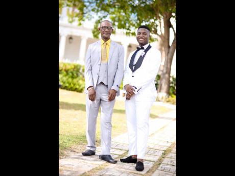 The groom is happy to be joined in lens time by his father-in-law, Samuel Graham. 