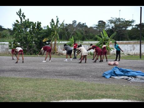Female students and their teacher at Herbert Morrison Technical High School during a physical education class on Monday, the first day of the resumption of face-to-face classes since 2020.