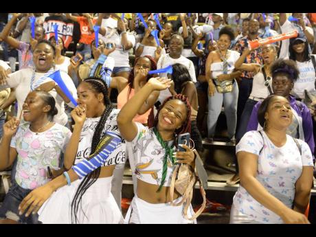 Fans cheer on their favourite girls’ schools at a previous staging of the ISSA/GraceKennedy Boys’ and Girls’ Athletics Championships at the National Stadium in Kingston.