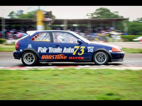 Spence taking his Honda Civic racecar through its paces, at a past Jamwest event.