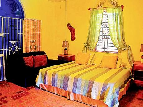 One of the four colourful bedrooms.