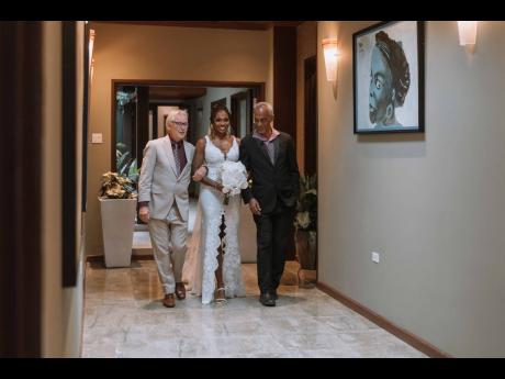 The bride, Liane Chung (now Liane Barakat), felt safe and serene as she was walked to meet her husband by the two gentlemen who set the standard for what she needed to look for in a man, her stepfather Jan Voordouw (left) and father Mark Chung.