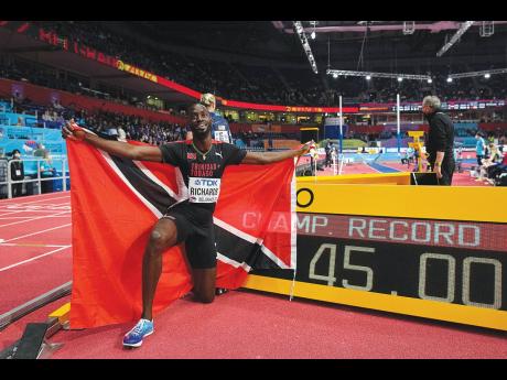 Jereem Richards, of Trinidad And Tobago, poses after winning and setting a new championship record in the Men’s 400 meters at the World Athletics Indoor Championships in Belgrade, Serbia, yesterday.