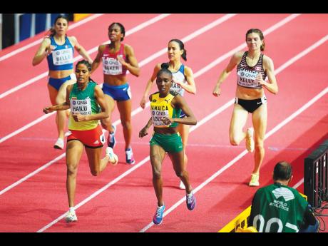 AP photos
Natoya Goule (foreground right), of Jamaica, and Freweyni Hailu (foreground left), of Ethiopia, compete in a women’s 800-metre heat at the World Athletics Indoor Championships in Belgrade, Serbia, yesterday.