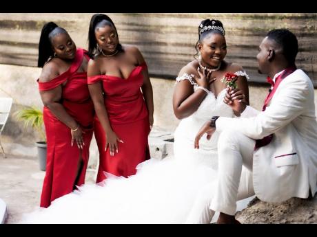 ‘Finding you was the greatest surpsie and the best gift I could have ever reeived,’ Jeremy said to his beautiful blushing bride. Her bridesmaid, Dionne Worrell and maid of honour (sister of the bride) Zeirleshea O’Haro look on in approval.