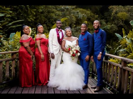 The Watkis’ (centre) kept their bridal party small, honouring bridesmaid Dionne Worrell (left), maid of honour Zeirleshea O’Haro (second left), bestman Raylon Ricketts (second right) and Daniel Dennis with the opportunity to stand by their side on thei