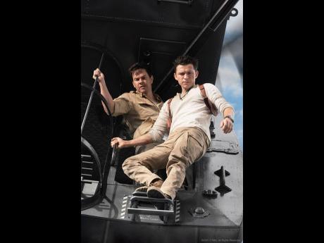 Tom Holland and Mark Wahlberg star in the action adventure ‘Uncharted’.