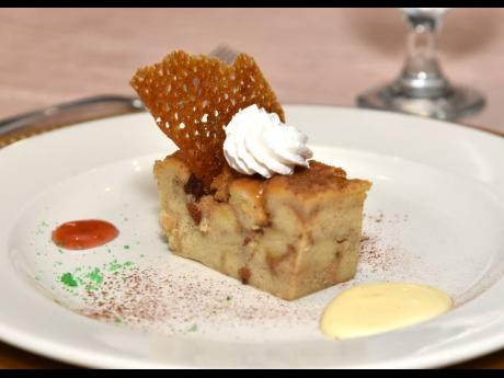 There’s nothing quite like a lightly sweetened rum sauce and natural fruit compote to change the overall presentation of a dessert like The Jamaica Pegasus’ classic bread-and-butter pudding dressed with a fancy, toasted brown sugar and caramel topper t