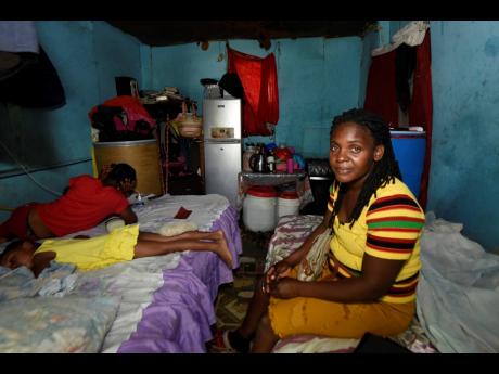 Inside the one-bedroom house that Delmoi Bailey shares with her mother and four children.