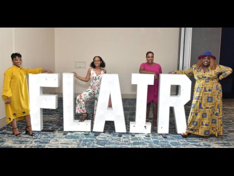 A closer look at the bold and fierce lit letters, which proved to be the word that encapsulated the Distinguished Award Ceremony: FLAIR. Meet members of the Flair team: (from left) lifestyle and entertainment editor, Jamila Litchmore; lifestyle and enterta