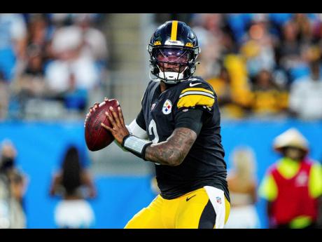AP
Pittsburgh Steelers quarterback Dwayne Haskins plays against the Carolina Panthers during the first half of a preseason NFL football game on Friday, August 27, 2021, in Charlotte, North Carolina.