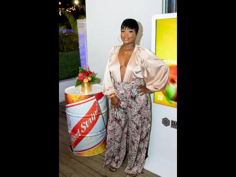Chef Sheneen Johnson made a statement in this champagne-and-print ensemble.