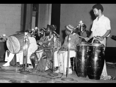 Ras Michael and the Sons of Negus at the Clancy Eccles Roots Revue held at the Carib theatre on January 1, 1977,