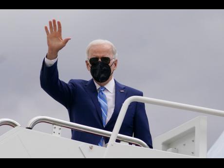 President of the United States Joe Biden boards Air Force One at Andrews Air Force Base, Maryland on Tuesday, April 12, 2022, en route to Menlo, Iowa.