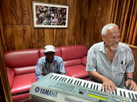 Beres Hammond in studio vibing to  the music from veteran keyboard player, Robbie Lyn. 