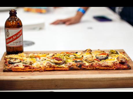 One of the teams participating in Thursday night’s culinary pairing session of the Kingston City Beer Fest certainly knew what they were doing as seen with this pizza creation cooked to perfection. 