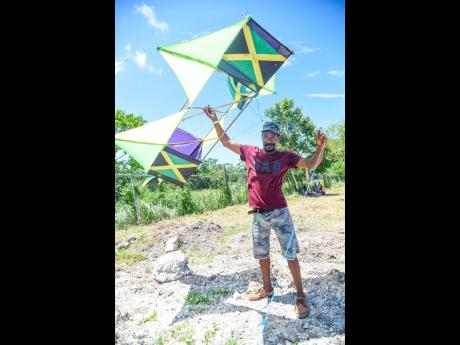 Michael Goldson poses with his box kite.