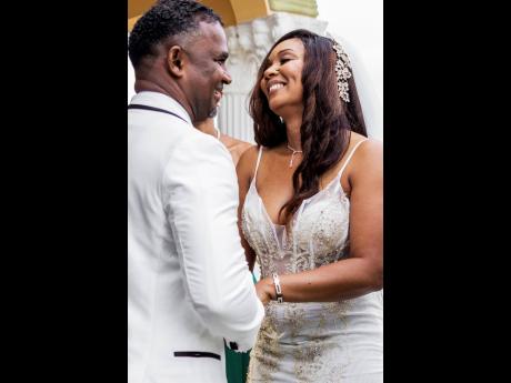 Lorraine and Otis bask in nuptial bliss during their wedding ceremony.