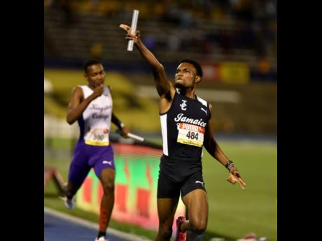 
Jamaica College’s Handal Roban anchors the 4x400m Boys’ Open Relay team to gold at the ISSA/GraceKennedy Boys and Girls’ Athletics Championships inside the National Stadium recently.