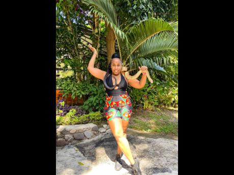 Dance educator and choreographer Latonya Style releases all her inhibitions as she becomes one with a viper at the Konoko Falls and Park mini zoo in Ocho Rios.