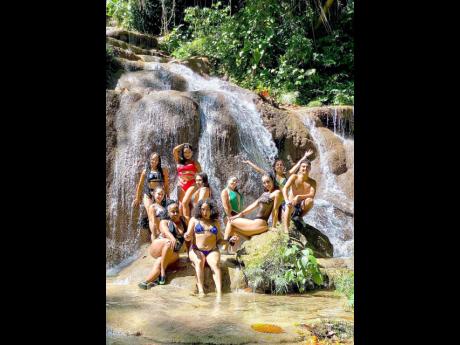 In the middle of Konoko Falls and Park mini zoo in Ocho Rios, Latonya Style and her group capture a moment.