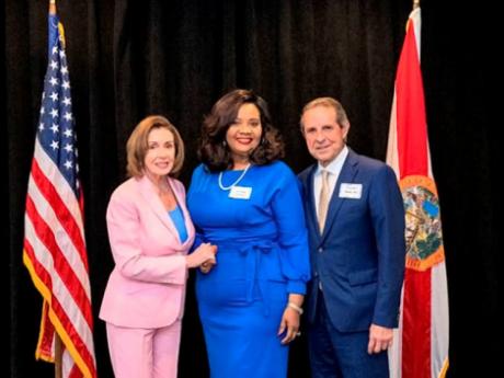 From left are Nancy Pelosie, Speaker of the United States Congress; the Rev D. Karen Green, candidate; and Manny Diaz, chairman of the Florida Democratic Party. 