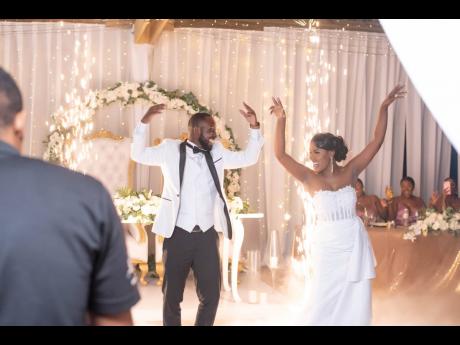 ‘Watch di couple, ah nuh single. Leggo di bird!’ The lovely couple engage in a festive first dance as husband and wife.