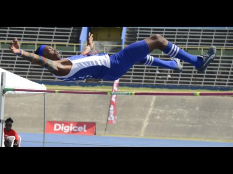 Romaine Beckford winning the Class Two boys high jump with a record leap of 2.05 metres at the 2018 Eastern Athletics Championship at the National Stadium.