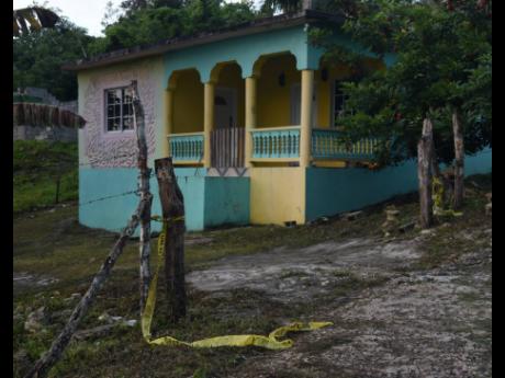 The rented home where 20-year-old Christie McBean’s body was found at Lover’s Lane in Hurlock, St James, on Monday.  Her six-month-old baby was found in the crib dehydrated.