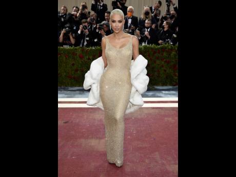 Kim Kardashian took Marilyn Monroe’s former ‘Happy Birthday Mr President’ dress out for the night.