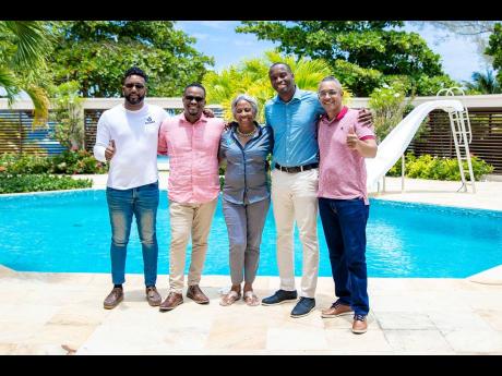 Thumbs up. From left: Larren Peart, CEO of Bluedot, Gordon Swaby, CEO of Edufocal, Sandra Glasgow, managing director of RevUP, Ricardo Allen, CEO of One on One Educational services and Christopher Barnes, COO of RJRGLEANER Communications Group.