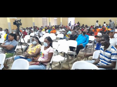 Farming interests attending a town-hall meeting in Guy’s Hill, St Catherine, Wednesday.