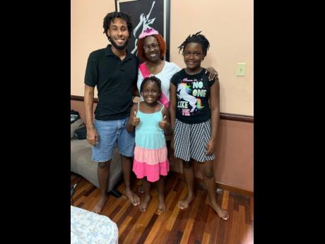 Dr Nicola Skyers and her children (from left) Travis, Leanne and Gabrielle Flemmings.
