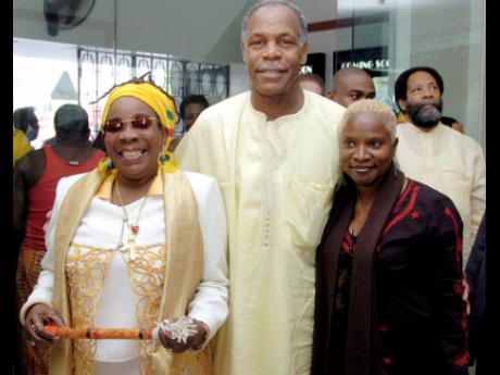 From left:  Rita Marley, American actor and activist  Dany Glover and Beninese singer and actress Angelique Kidjo arrive at Carib 5 in Cross Roads, St. Andrew for the premier of the film ‘Africa Unite’ on February 6, 2008.