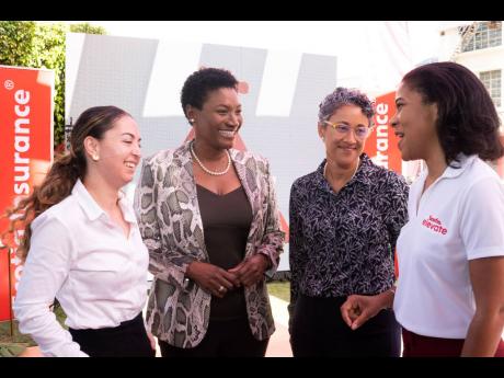 From left: Joanna Marzouca, associate at Myers Fletcher and Gordon; Audrey Tugwell Henry, president & CEO, Scotia Group Jamaica; Gina Phillipps Black, partner at Myers Fletcher and Gordon; and Kerry-Ann Chong, director of sales and service at Scotia Jamaic