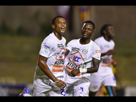 Mount Pleasant’s Tarick Ximines celebrates after scoring his second goal of the night against Molynes United in action from the Jamaica Premier League’s Monday Night Football.