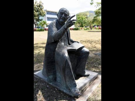 A statue of the late Father Philip Sherlock is seen at the Mona Campus of The University of the West Indies. Campus security has ramped up patrols after the sexual assault of a student on May 5.