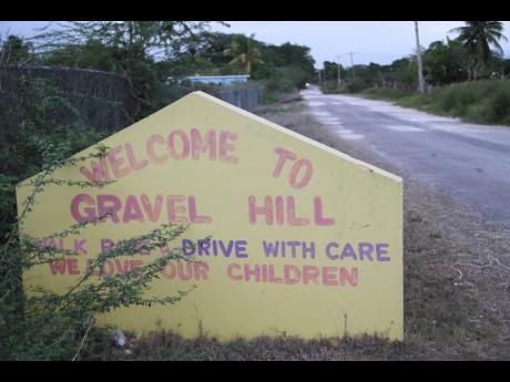 The deplorable section of road leading to the Gravel Hill community in Clarendon.