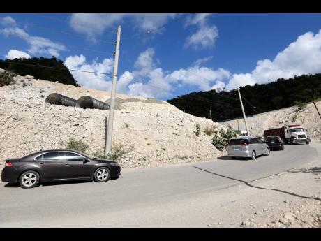 Motorists navigate one of the curves along the Grants Pen main road in St Thomas on January 27 this year. The South Coast Highway Improvement Project is expected to open new frontiers of investment and development in St Thomas and Portland.