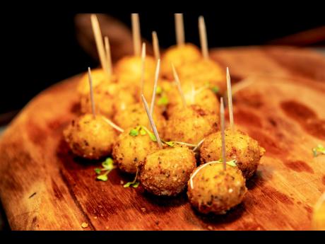 The night’s exciting menu included the bacon and honey goat cheese balls with marinara sauce.